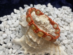 Makramee-Armband mit Karneol-Perlen, Textilband orange, handgefertigt